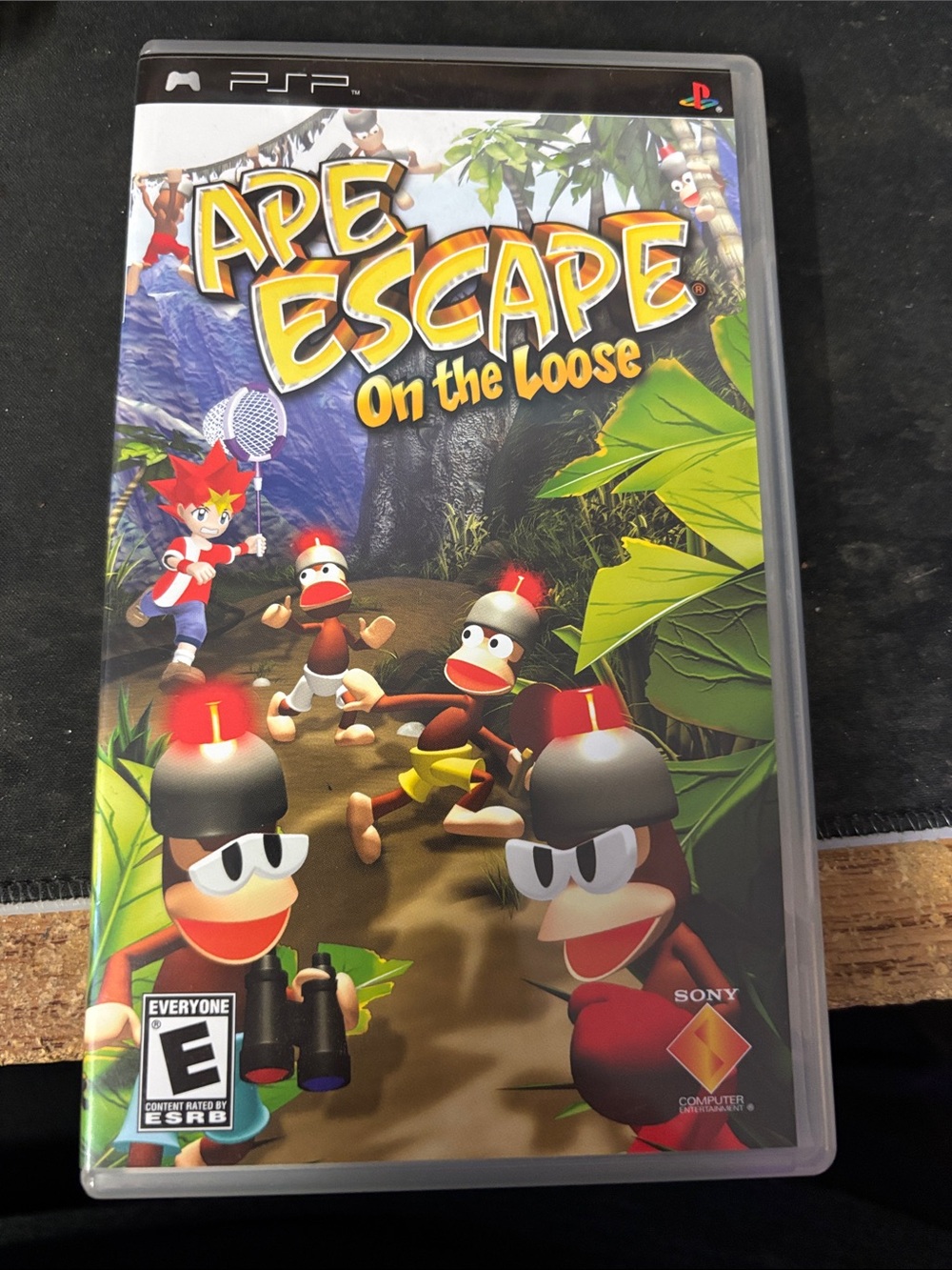 Sony PSP Ape Escape: On the Loose - Green & Yellow Cover Art